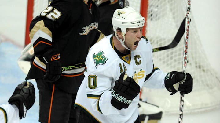 Apr 10, 2008; Anaheim, CA, USA; Dallas Stars left wing Brendan Morrow (10) celebrates after scoring a goal in the second period as Anaheim Ducks center Todd Marchant (22) watches in the Western Conference quarterfinal at the Honda Center. Mandatory Credit: Kirby Lee/Image of Sport-Imagn Images