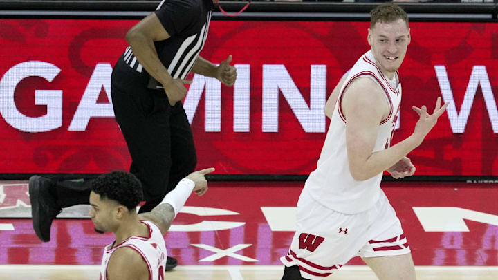 Wisconsin forward Austin Rapp (22) reacts after hitting a three-point basket during the first half of their game against Ohio State Saturday, January 31, 2026 at the Kohl Center in Madison, Wisconsin.