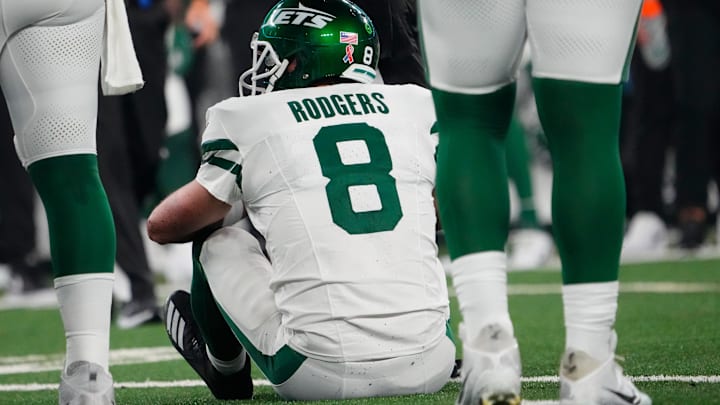 Sep 11, 2023; East Rutherford, New Jersey, USA; New York Jets quarterback Aaron Rodgers (8) sits on