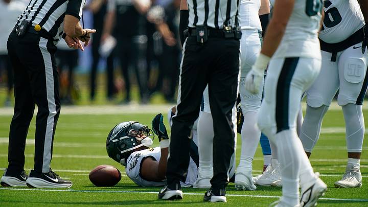 Philadelphia Eagles running back Saquon Barkley (26) had to leave the field after a big hit by Tennessee Titans defensive tackle Jeffery Simmons (98) during the first quarter on Sept. 20, 2026, at Nissan Stadium in Nashville. Philadelphia Eagles running back Saquon Barkley (26) had to leave the field after a big hit by Tennessee Titans defensive tackle Jeffery Simmons (98) during the first quarter on Sept. 20, 2026, at Nissan Stadium in Nashville.
