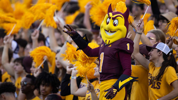 Nov 23, 2024; Tempe, Arizona, USA; Arizona State Sun Devils mascot Sparky against the Brigham Young Cougars in the second half at Mountain America Stadium. Mandatory Credit: Mark J. Rebilas-Imagn Images