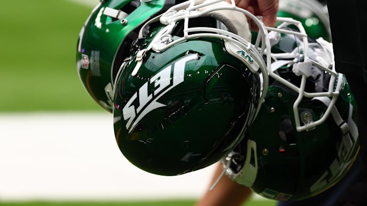 Oct 6, 2024; Tottenham, ENG; New York Jets helmets are held by staff before the match against Minnesota Vikings at Tottenham Hotspur Stadium. Mandatory Credit: Shaun Brooks-Imagn Images Oct 6, 2024; Tottenham, ENG; New York Jets helmets are held by staff before the match against Minnesota Vikings at Tottenham Hotspur Stadium. Mandatory Credit: Shaun Brooks-Imagn Images
