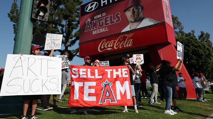 May 23, 2026; Anaheim, California, USA; Los Angeles Angels fans gather outside Angel Stadium before the game between the Los Angeles Angels and the Texas Rangers to protest the Angels team owner Arte Moreno. Mandatory Credit: Kiyoshi Mio-Imagn Images May 23, 2026; Anaheim, California, USA; Los Angeles Angels fans gather outside Angel Stadium before the game between the Los Angeles Angels and the Texas Rangers to protest the Angels team owner Arte Moreno. Mandatory Credit: Kiyoshi Mio-Imagn Images