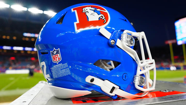 Jan 5, 2025; Denver, Colorado, USA; Detailed view of a Denver Broncos throwback helmet following the win against the Kansas City Chiefs at Empower Field at Mile High. Jan 5, 2025; Denver, Colorado, USA; Detailed view of a Denver Broncos throwback helmet following the win against the Kansas City Chiefs at Empower Field at Mile High.