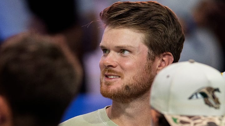 Minnesota Vikings quarterback Sam Darnold attends the TGL match between Jupiter Links GC and Atlanta Drive GC at SoFi Center on March 4, 2025, in Palm Beach Gardens, Florida.