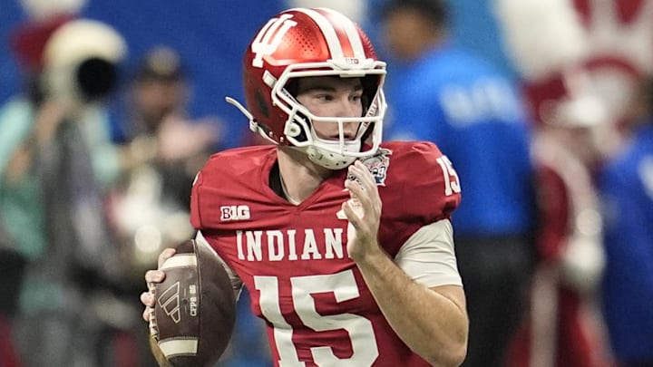 Jan 9, 2026; Atlanta, GA, USA; Indiana Hoosiers quarterback Fernando Mendoza (15) passes against the Oregon Ducks during the first half of the 2025 Peach Bowl and semifinal game of the College Football Playoff at Mercedes-Benz Stadium. Mandatory Credit: Dale Zanine-Imagn Images Jan 9, 2026; Atlanta, GA, USA; Indiana Hoosiers quarterback Fernando Mendoza (15) passes against the Oregon Ducks during the first half of the 2025 Peach Bowl and semifinal game of the College Football Playoff at Mercedes-Benz Stadium. Mandatory Credit: Dale Zanine-Imagn Images