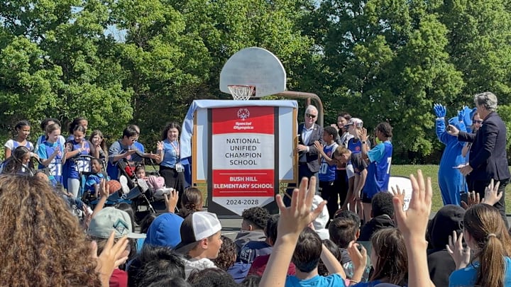 As students and staff cheer, Bush Hill Elementary School in Alexandria, Viriginia, is recognized as a Special Olympics Unified Champion.