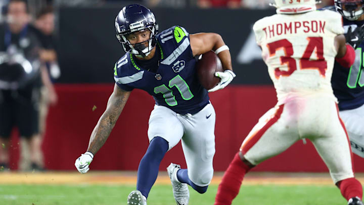 Sep 25, 2025; Glendale, Arizona, USA; Seattle Seahawks wide receiver Jaxon Smith-Njigba (11) runs against the Arizona Cardinals in the third quarter at State Farm Stadium. 