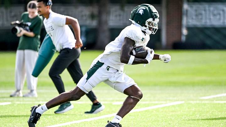 Michigan State receiver Fredrick Moore runs after a catch during football practice on Monday, Aug. 17, 2026, in East Lansing. Michigan State receiver Fredrick Moore runs after a catch during football practice on Monday, Aug. 17, 2026, in East Lansing.