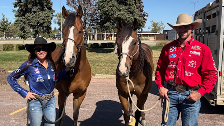 L-R: Barrel racer Megan McLeod-Sprague and Seis Corona "Jag" and Telle Em PYC "Banker" and steer wrestler Justin Shaffer at the Governor's Cup in Sioux Falls, S.D. L-R: Barrel racer Megan McLeod-Sprague and Seis Corona "Jag" and Telle Em PYC "Banker" and steer wrestler Justin Shaffer at the Governor's Cup in Sioux Falls, S.D.