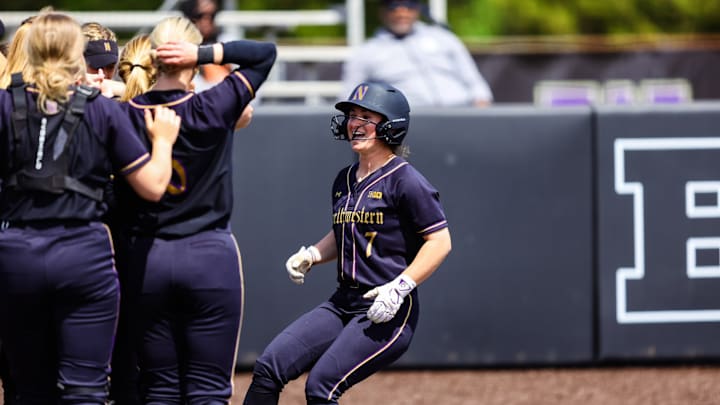 Kelsey Nader runs to celebrate with teammates. Kelsey Nader runs to celebrate with teammates.