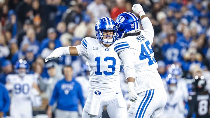 Tausili Akana and Viliami Po'uha against Cincinnati Tausili Akana and Viliami Po'uha against Cincinnati