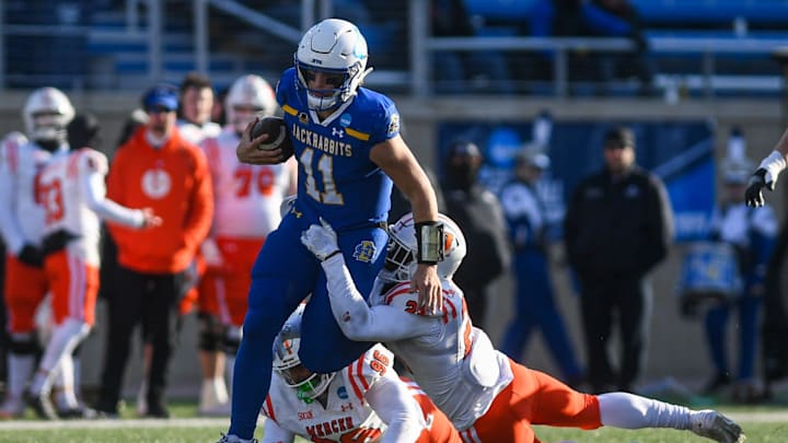 SDSU's quarterback Mark Gronowski (11) runs with the ball during a game against Mercer University on Saturday, Dec. 2, 2023 at Dana J Dykhouse Stadium in Brookings.