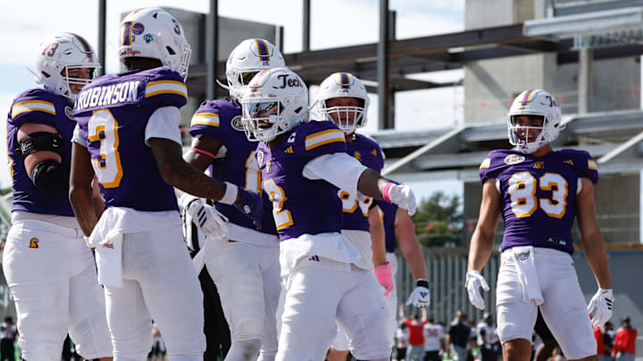 Tremel Jones and his Tennessee Tech teammates celebrate a touchdown Tremel Jones and his Tennessee Tech teammates celebrate a touchdown