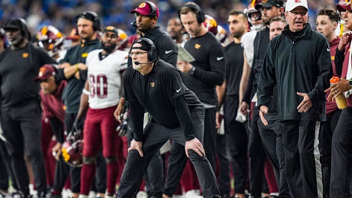 Washington Commanders head coach Dan Quinn on the sideline in the first half against the Detroit Lions.