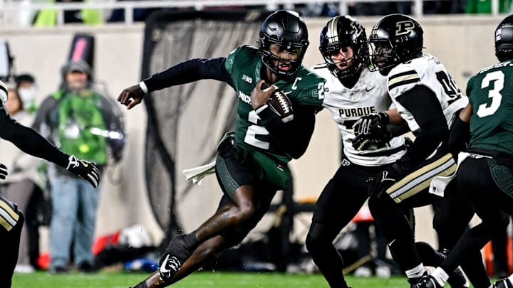 Michigan State's Aidan Chiles runs for a gain against Purdue during the first quarter on Friday, Nov. 22, 2024, at Spartan Stadium in East Lansing.