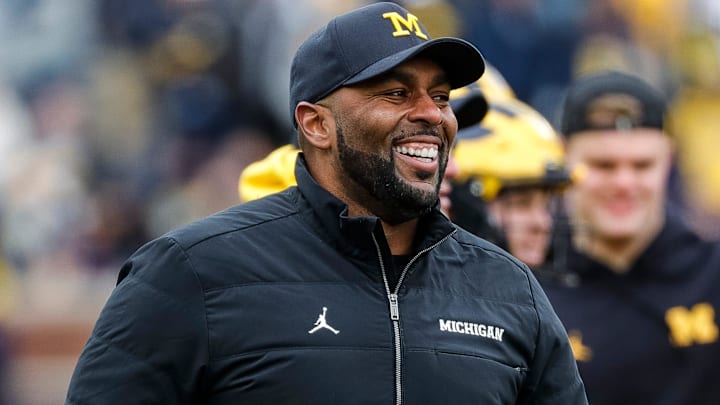 Michigan head coach Sherrone Moore watches warm up during the spring game at Michigan Stadium in Ann Arbor on Saturday, April 20, 2024.