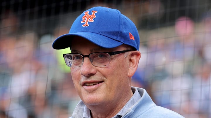 Aug 14, 2025; New York City, New York, USA; New York Mets owner Steve Cohen stands on the field before a ceremony to honor first baseman Pete Alonso (not pictured) for breaking the Mets all time home run record before a game against the Atlanta Braves at Citi Field. Mandatory Credit: Brad Penner-Imagn Images