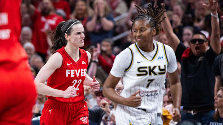 May 17, 2025; Indianapolis, Indiana, USA; Indiana Fever guard Caitlin Clark (22) celebrates a made basket in the second half against the Chicago Sky at Gainbridge Fieldhouse. Mandatory Credit: Trevor Ruszkowski-Imagn Images