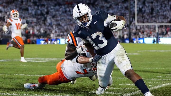 Penn State Nittany Lions running back Kaytron Allen (13) is pushed out of bounds