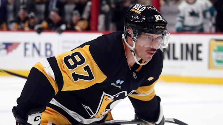 Nov 16, 2024; Pittsburgh, Pennsylvania, USA;  Pittsburgh Penguins center Sidney Crosby (87) prepares to take a face-off against the San Jose Sharks during the third period at PPG Paints Arena.