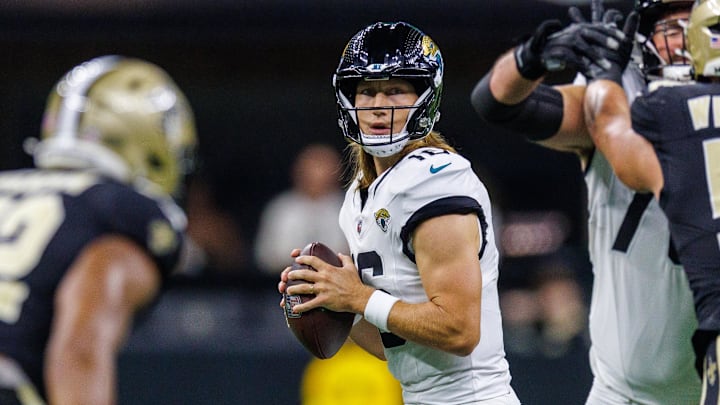 Aug 17, 2025; New Orleans, Louisiana, USA;  Jacksonville Jaguars quarterback Trevor Lawrence (16) looks downfield against the New Orleans Saints during the first half at Caesars Superdome. 
