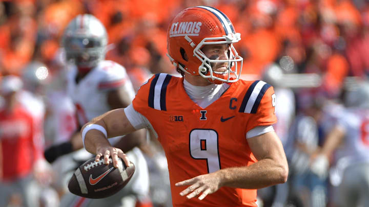 Oct 11, 2025; Champaign, Illinois, USA; Illinois Fighting Illini quarterback Luke Altmyer (9) passes against the Ohio State Buckeyes during the second half at Memorial Stadium. Mandatory Credit: Ron Johnson-Imagn Images Oct 11, 2025; Champaign, Illinois, USA; Illinois Fighting Illini quarterback Luke Altmyer (9) passes against the Ohio State Buckeyes during the second half at Memorial Stadium. Mandatory Credit: Ron Johnson-Imagn Images