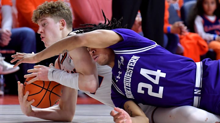 Jan 26, 2025; Champaign, Illinois, USA; Illinois Fighting Illini guard Kasparas Jakucionis (32) and Northwestern Wildcats guard K.J. Windham (24) vie for a loose ball on the floor during the first half at State Farm Center. Mandatory Credit: Ron Johnson-Imagn Images Jan 26, 2025; Champaign, Illinois, USA; Illinois Fighting Illini guard Kasparas Jakucionis (32) and Northwestern Wildcats guard K.J. Windham (24) vie for a loose ball on the floor during the first half at State Farm Center. Mandatory Credit: Ron Johnson-Imagn Images