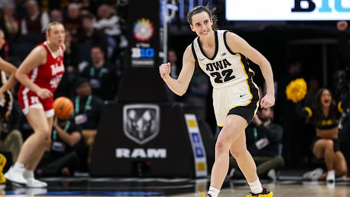 Mar 10, 2024; Minneapolis, MN, USA; Iowa Hawkeyes guard Caitlin Clark (22) celebrates her shot against Nebraska in the Big Ten women's basketball Championship.