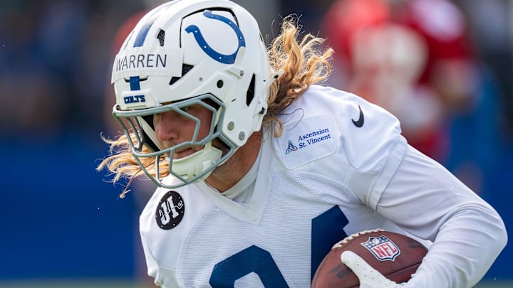 Indianapolis Colts tight end Tyler Warren (84) runs after catching a pass Friday, July 25, 2025, during training camp held at Grand Park in Westfield.