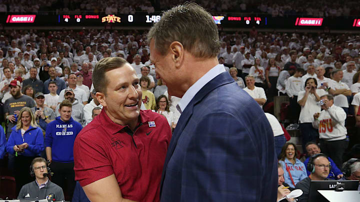 TJ Otzelberger and Bill Self square off in a key Big 12 Conference showdown in Ames Wednesday night.