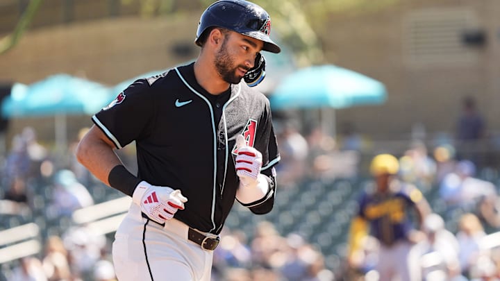 Arizona Diamondbacks Jordan Lawlar rounds the bases after hitting a two-run home run off Milwaukee Brewers pitcher Tyler Alexander in the second inning of a spring training game on Feb. 26, 2025, at Salt River Fields at Talking Stick in Scottsdale, Ariz.