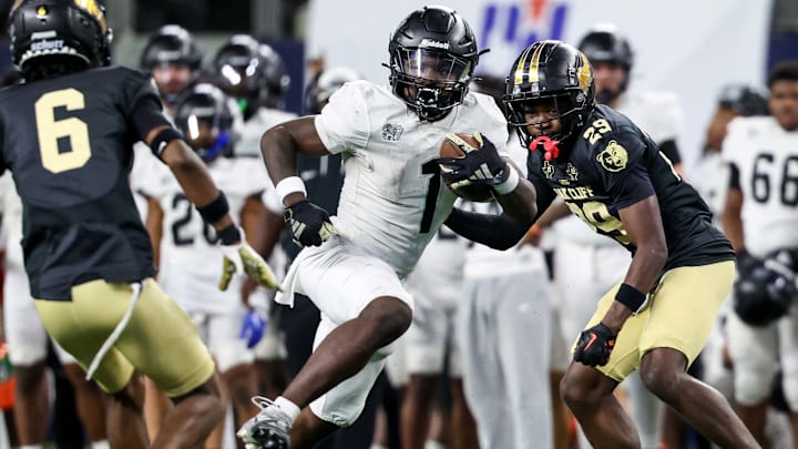 Running back Landen Williams-Callis of Richmond Randle carries during the Texas 5A Division 2 state title game at AT&T Stadium.
