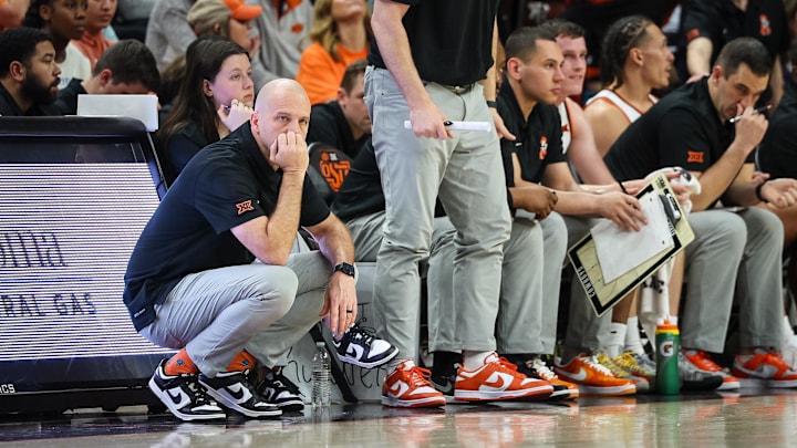 Feb 15, 2025; Stillwater, Oklahoma, USA; Oklahoma State Cowboys coach Steve Lutz watches game play during the second half against the Texas Tech Red Raiders at Gallagher-Iba Arena. Mandatory Credit: William Purnell-Imagn Images