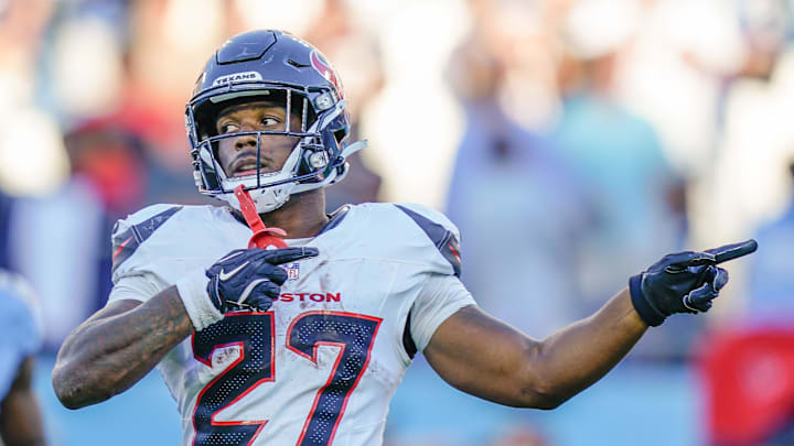Houston Texans running back Woody Marks (27) signals a first down during the fourth quarter against the Tennessee Titans at Nissan Stadium in Nashville, Tenn., Sunday, Nov. 16, 2025.