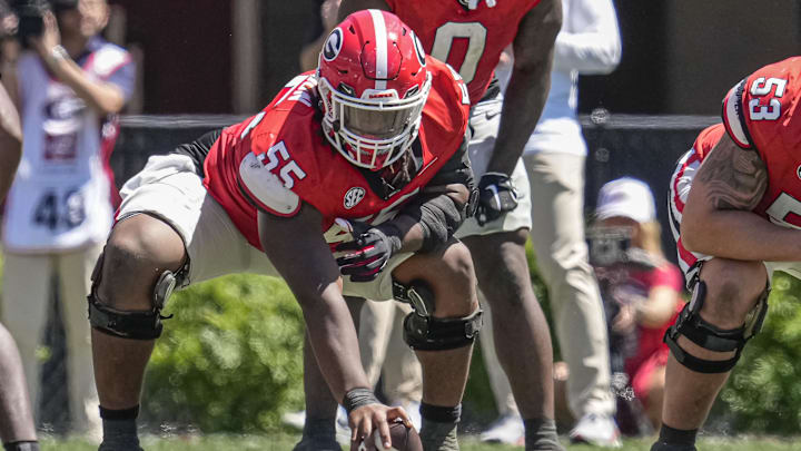 Apr 13, 2024; Athens, GA, USA; Georgia Bulldogs center Jared Wilson (55) prepares to snap the ball during the G-Day Game at Sanford Stadium. Mandatory Credit: Dale Zanine-Imagn Images
