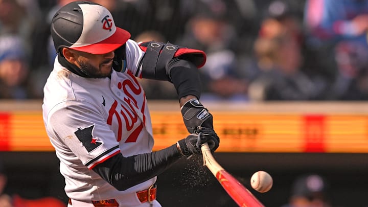 Apr 3, 2025; Minneapolis, Minnesota, USA;  Minnesota Twins infielder Carlos Correa (4) breaks his bat on a foul ball against the Houston Astros sixth inning during the at Target Field.