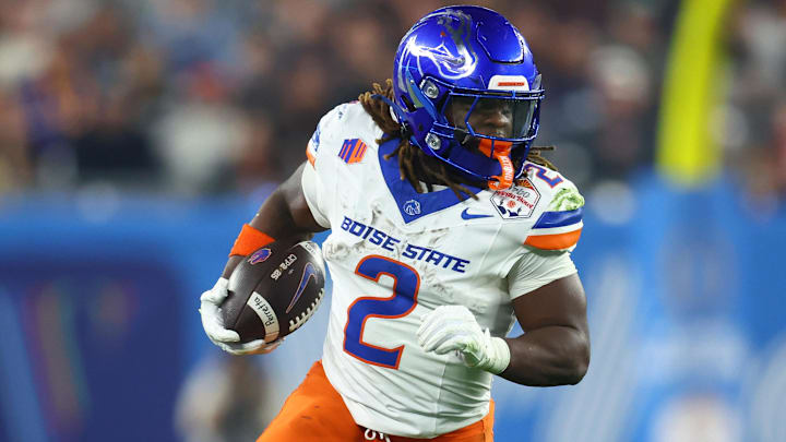 Dec 31, 2024; Glendale, AZ, USA; Boise State Broncos running back Ashton Jeanty (2) rushes the ball against the Penn State Nittany Lions during the first half in the Fiesta Bowl at State Farm Stadium. Dec 31, 2024; Glendale, AZ, USA; Boise State Broncos running back Ashton Jeanty (2) rushes the ball against the Penn State Nittany Lions during the first half in the Fiesta Bowl at State Farm Stadium.