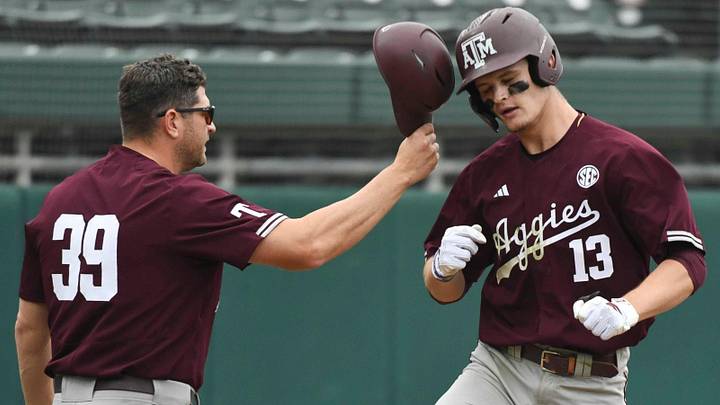 Texas A&M assistant coach Nolan Cain congratulates Caden Sorrell as he rounds third after hitting a grand slam against Alabama at Sewell-Thomas Stadium in the first game of a double header Friday. Texas A&M assistant coach Nolan Cain congratulates Caden Sorrell as he rounds third after hitting a grand slam against Alabama at Sewell-Thomas Stadium in the first game of a double header Friday.