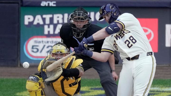 Milwaukee Brewers first baseman Andrew Vaughn (28) hits a double during the fourth inning of their game against the San Diego Padres Thursday, May 14, 2026 at American Family Field in Milwaukee, Wisconsin. Milwaukee Brewers first baseman Andrew Vaughn (28) hits a double during the fourth inning of their game against the San Diego Padres Thursday, May 14, 2026 at American Family Field in Milwaukee, Wisconsin.
