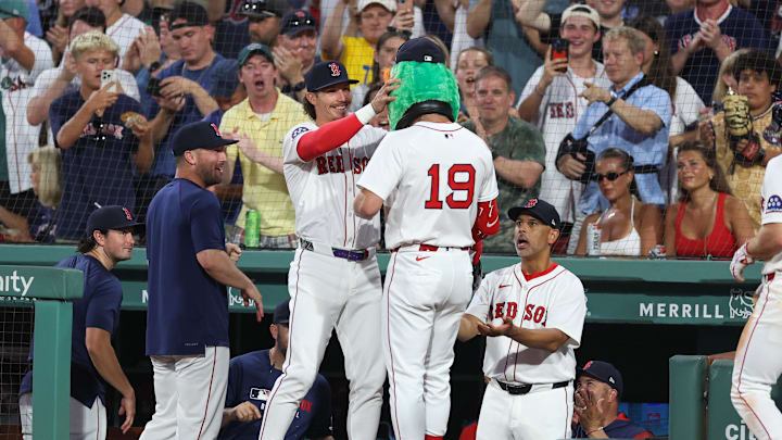 Jul 7, 2025; Boston, Massachusetts, USA; Boston Red Sox designated hitter Roman Anthony (19) celebrates with Boston Red Sox left fielder Jarren Duran (16) after hitting a two run home run during the fifth inning against the Colorado Rockies at Fenway Park. Mandatory Credit: Paul Rutherford-Imagn Images