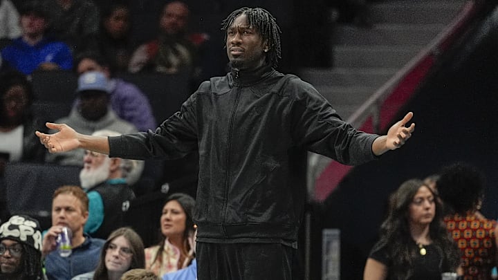 Jan 29, 2025; Charlotte, North Carolina, USA; Injured Charlotte Hornets center Mark Williams (5) reacts to a call during the second half against the Brooklyn Nets  at Spectrum Center. Mandatory Credit: Jim Dedmon-Imagn Images