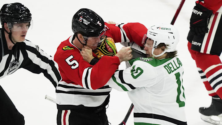 Mar 28, 2023; Chicago, Illinois, USA; Chicago Blackhawks defenseman Connor Murphy (5) and Dallas