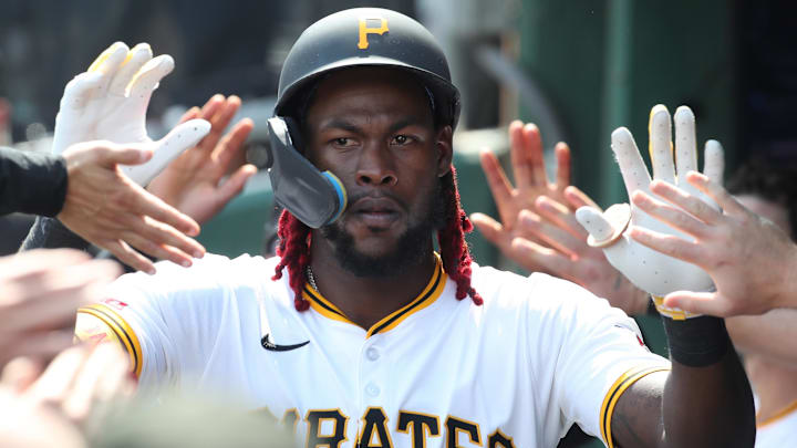 Jun 29, 2025; Pittsburgh, Pennsylvania, USA;  Pittsburgh Pirates center fielder Oneil Cruz (15) celebrates in the dugout after hitting his second home run of the game against the New York Mets during the seventh inning at PNC Park. Mandatory Credit: Charles LeClaire-Imagn Images
