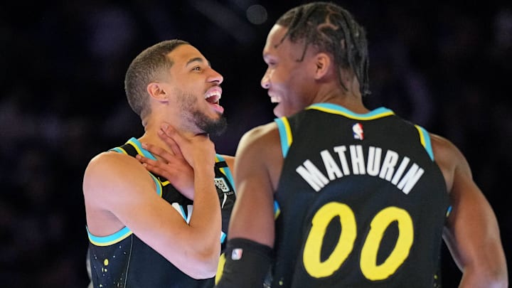 Feb 17, 2024; Indianapolis, IN, USA; Indiana Pacers guard Bennedict Mathurin (00) and guard Tyrese Haliburton (0) react after competing in the skills challenge during NBA All Star Saturday Night at Lucas Oil Stadium. Mandatory Credit: Kyle Terada-Imagn Images