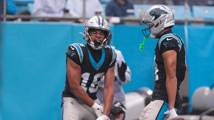 Nov 30, 2025; Charlotte, North Carolina, USA; Carolina Panthers wide receiver Jalen Coker (18) celebrates after scoring a touchdown during the third quarter at Bank of America Stadium. Mandatory Credit: Scott Kinser-Imagn Images