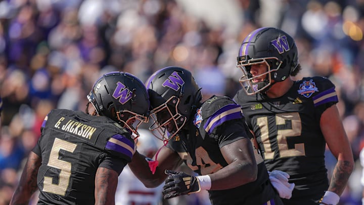 Washington player Giles Jackson (5) his touchdown against Louisville in the first quarter of the Tony the Tiger Sun Bowl game on Dec. 31, 2024.