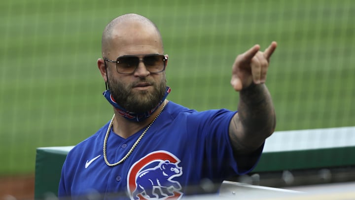 Apr 11, 2021; Pittsburgh, Pennsylvania, USA; Chicago Cubs quality assurance coach Mike Napoli (55) gestures to a Cubs fan during the seventh inning stretch against the Pittsburgh Pirates at PNC Park.