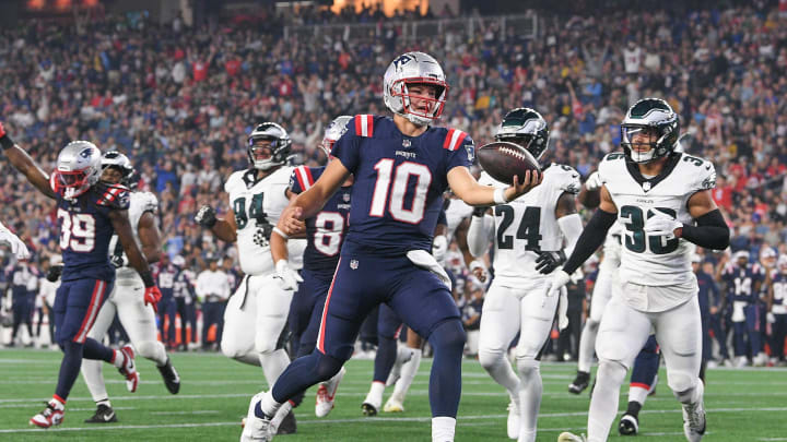 Aug 15, 2024; Foxborough, MA, USA; New England Patriots quarterback Drake Maye (10) runs the ball in for a touchdown against the Philadelphia Eagles during the first half at Gillette Stadium. Mandatory Credit: Eric Canha-USA TODAY Sports