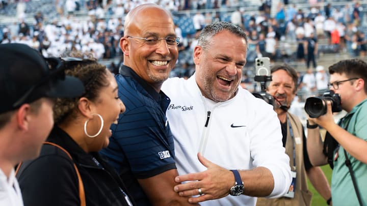 In his attempts to replace James Franklin (left), Penn State athletic director Pat Kraft (right) has ushered in a wave of contract extensions for rival college football coaches. In his attempts to replace James Franklin (left), Penn State athletic director Pat Kraft (right) has ushered in a wave of contract extensions for rival college football coaches.